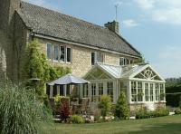 Bespoke cream double gable Hardwood conservatory
