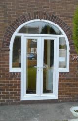 French doors in arched frame